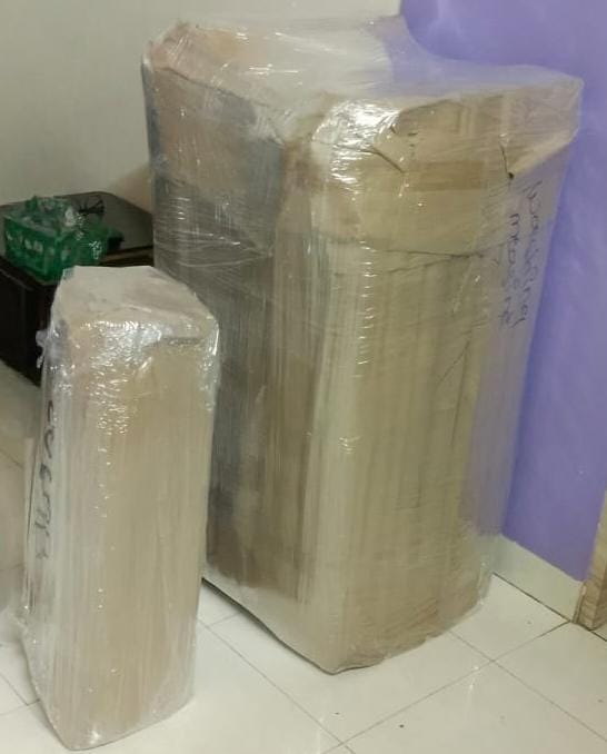 Professionally wrapped furniture with air bubble and corrugated sheet packing by Aparajeet Packers Pune